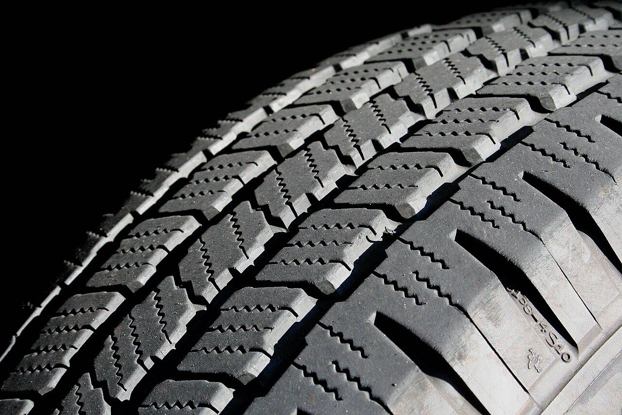 Close view of tire tread grooves and tread blocks