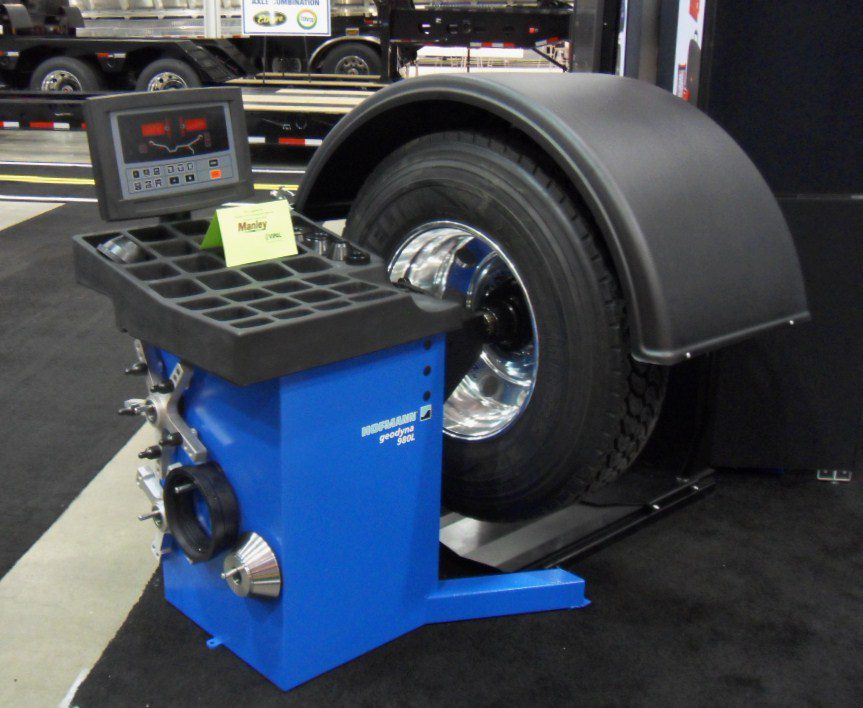 Wheel and tire mounted on a balancing machine